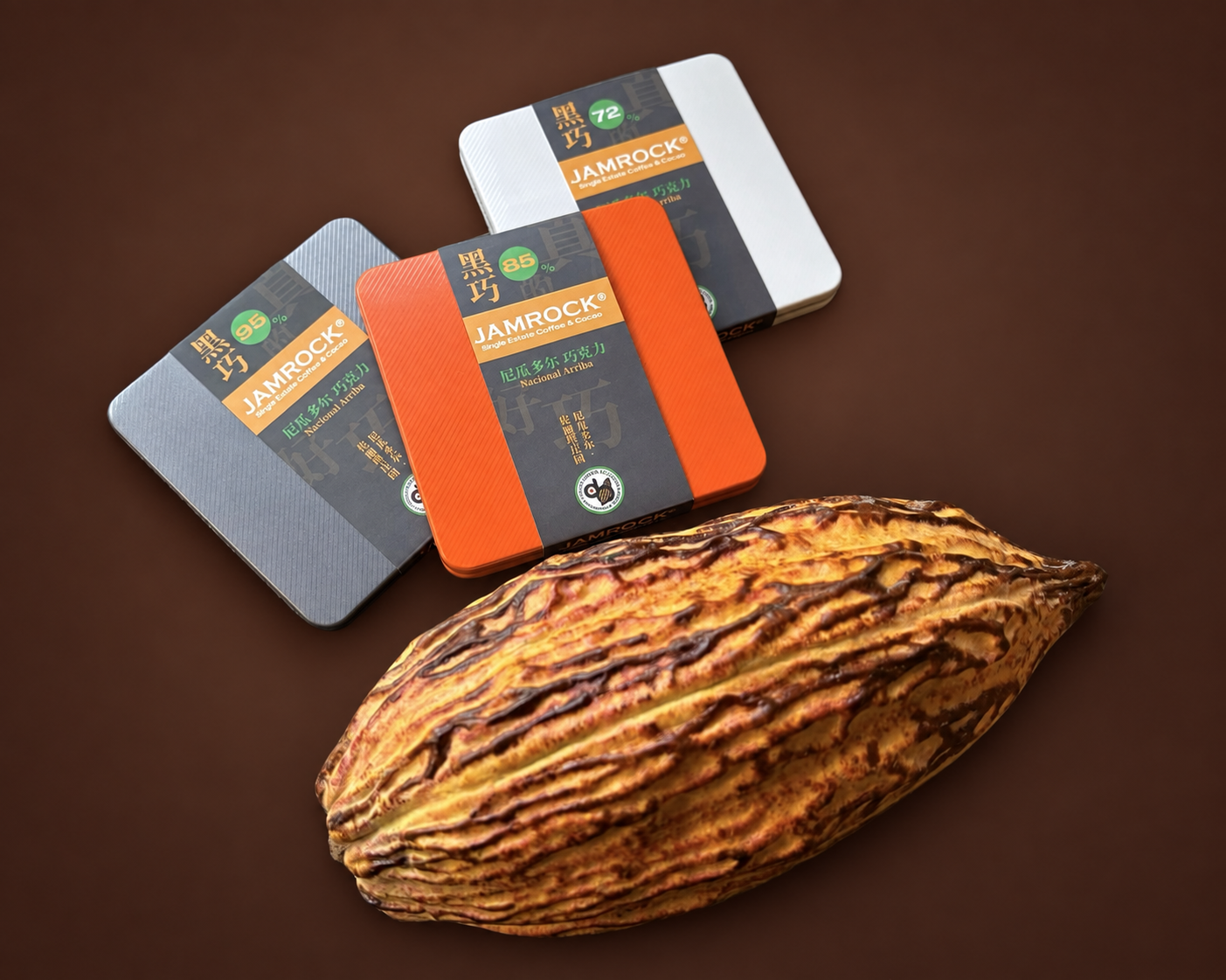 JAMROCK Arriba Nacional chocolate tins in 72, 85, and 95 percent cacao with a ripe cacao pod