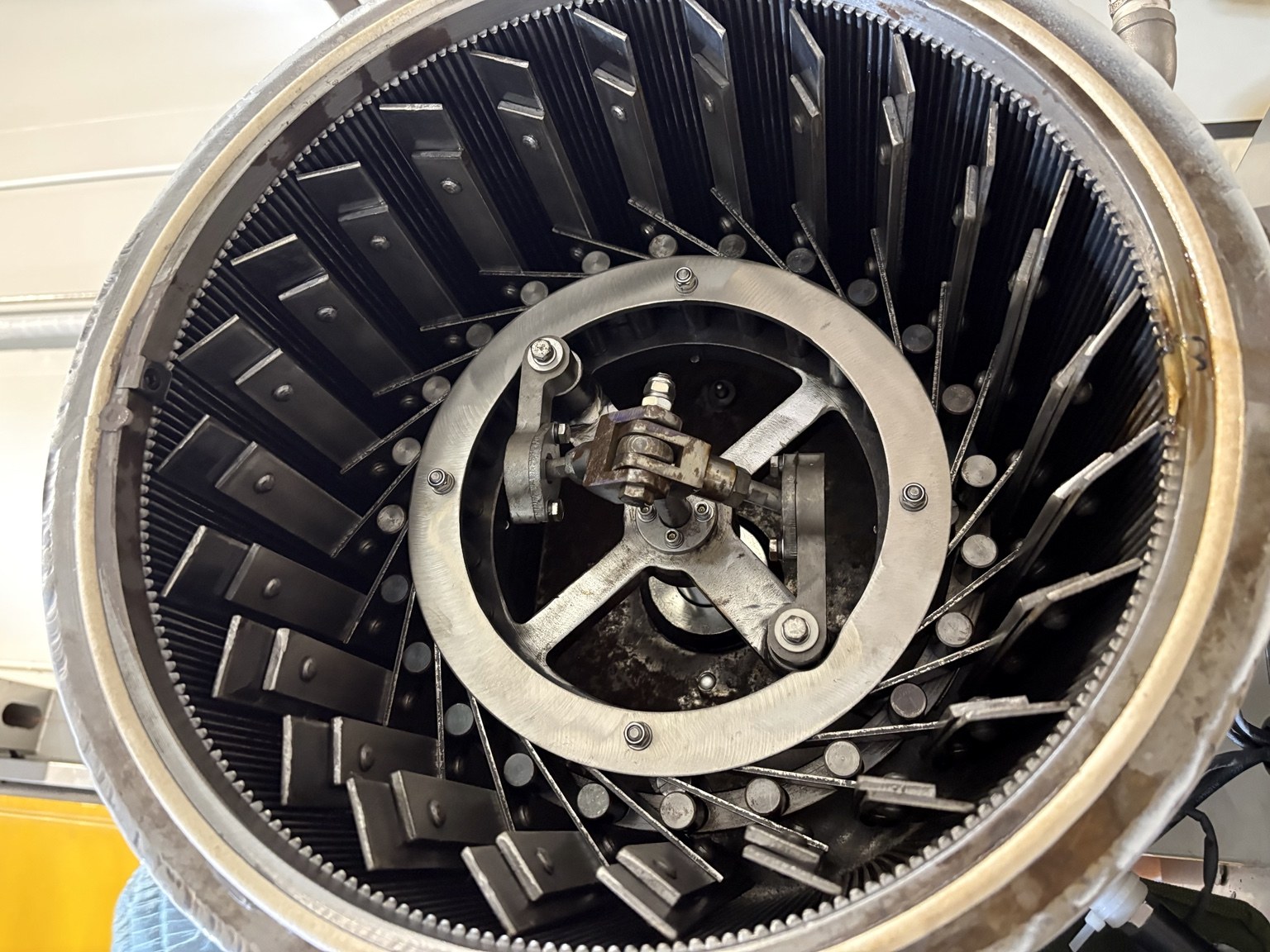 Interior of processing equipment showing the central rotor and surrounding metal elements